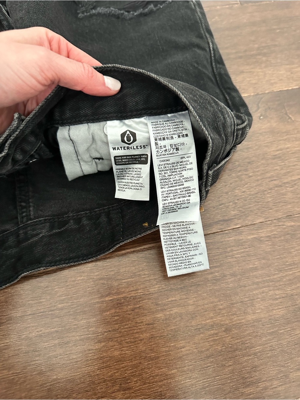 Levi's Black Washed Denim Shorts with Distressed Hem - Picture 3 of 4